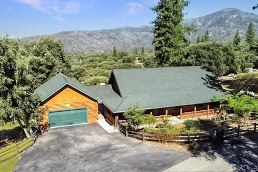 an aerial view of a house with a garage at Log cabin oasis with spectacular views & stargazing in Mariposa
