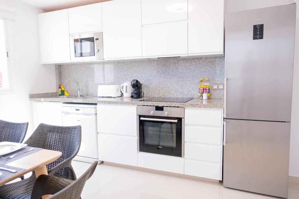 Kuchyň nebo kuchyňský kout v ubytování Villa privada en Corralejo