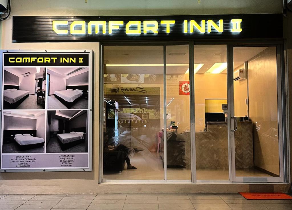 a store front with a sign that reads comfort inn at Comfort Inn Salim in Sibu