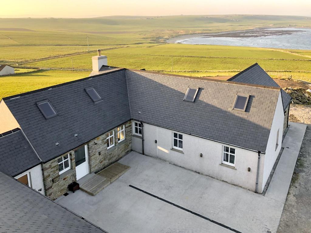 an aerial view of a house with a roof at Egypt in Newbigging