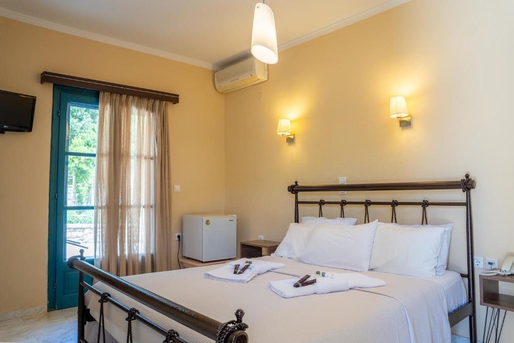 Booking.com: Karavostasi Beach Hotel , Πέρδικα, Ελλάδα . Κάντε κράτηση  ξενοδοχείου τώρα!