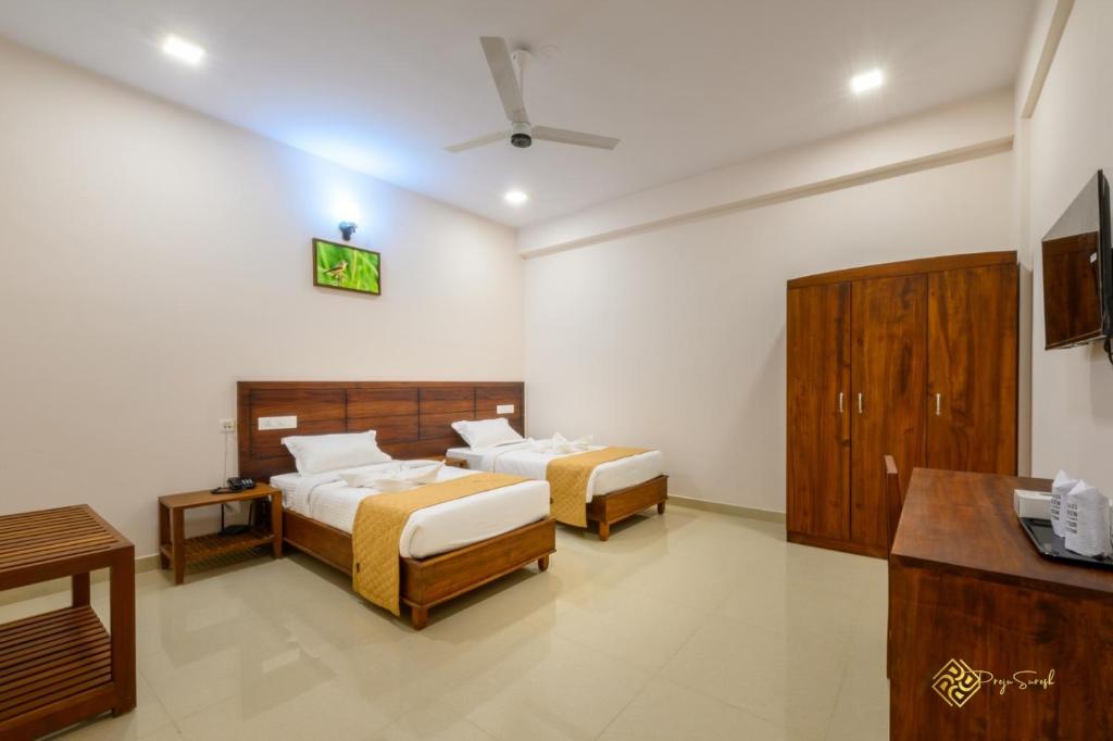 Postel nebo postele na pokoji v ubytování Daffodils Luxury Airport Suites