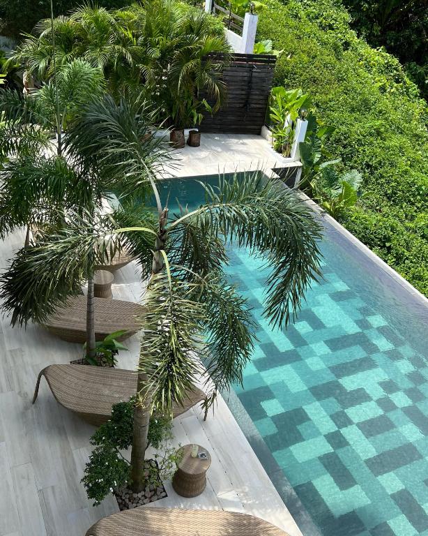 Bazén v ubytování Ahana Resort El Nido nebo v jeho okolí