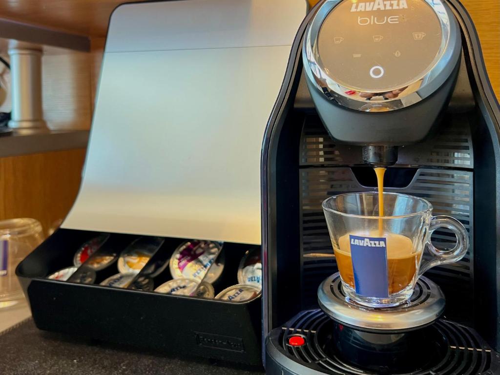Coffee and tea making facilities at Premium Apartment Midia Beach