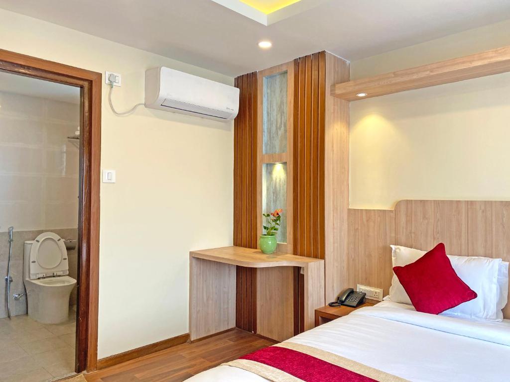 Postel nebo postele na pokoji v ubytování Hotel Nilakantha Pvt. Ltd