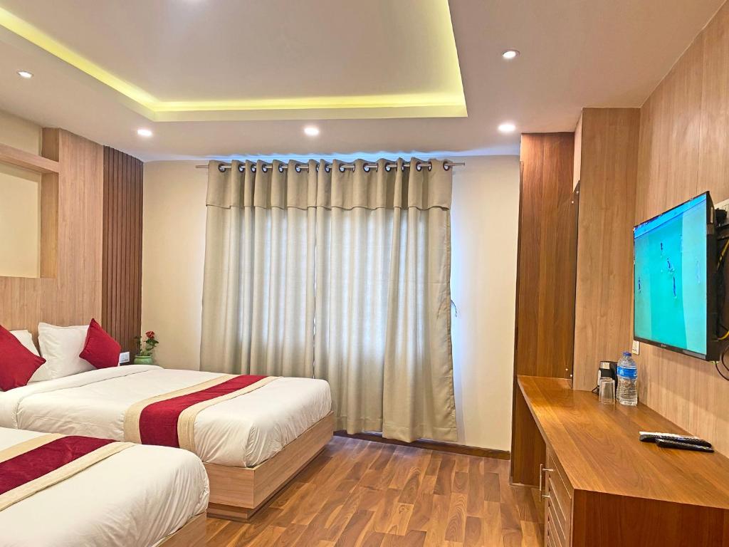 TV a/nebo společenská místnost v ubytování Hotel Nilakantha Pvt. Ltd