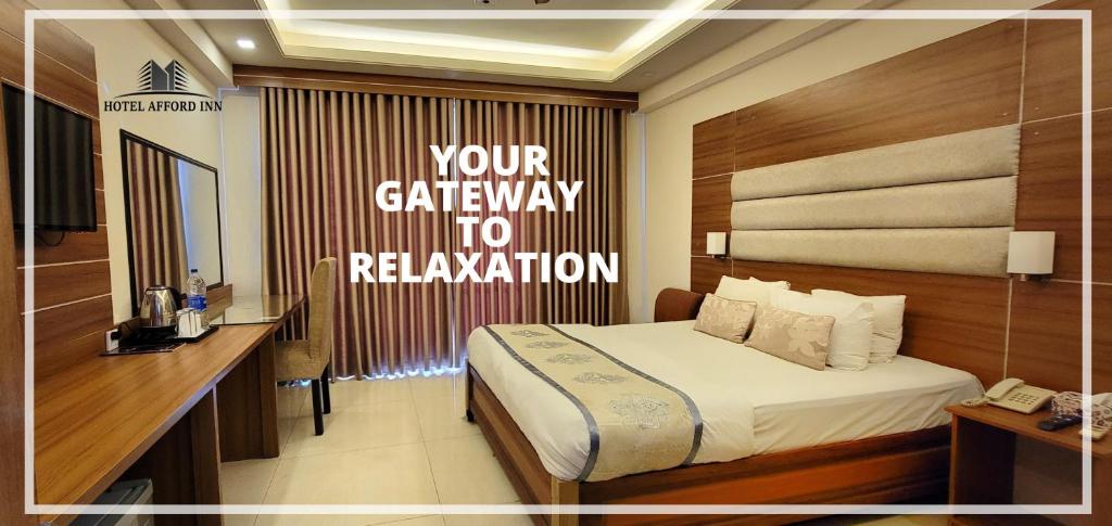 Postel nebo postele na pokoji v ubytování Hotel Afford Inn