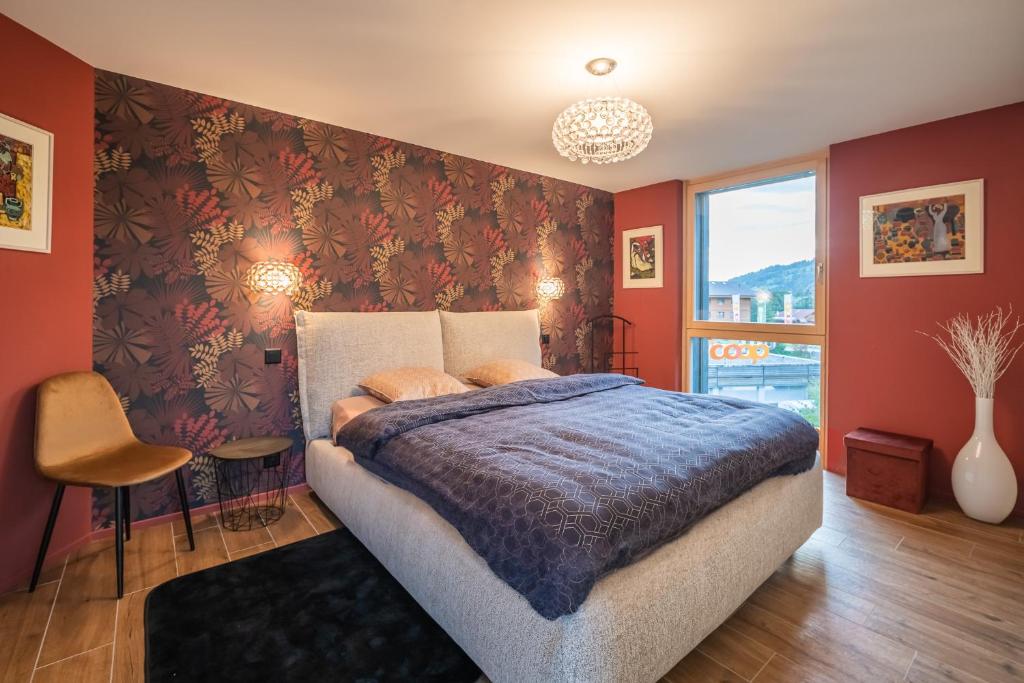 Postel nebo postele na pokoji v ubytování Un écrin face aux bains