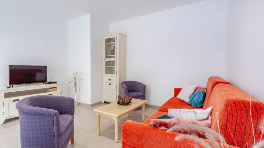 TV a/nebo společenská místnost v ubytování Casa del Sol