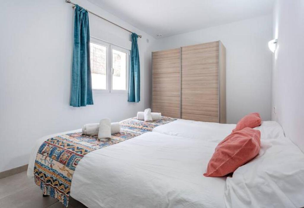 Postel nebo postele na pokoji v ubytování Casa del Sol