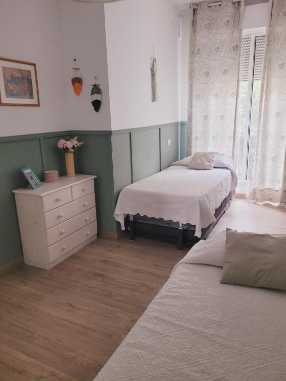 Posteľ alebo postele v izbe v ubytovaní Apartment in the center of Seville
