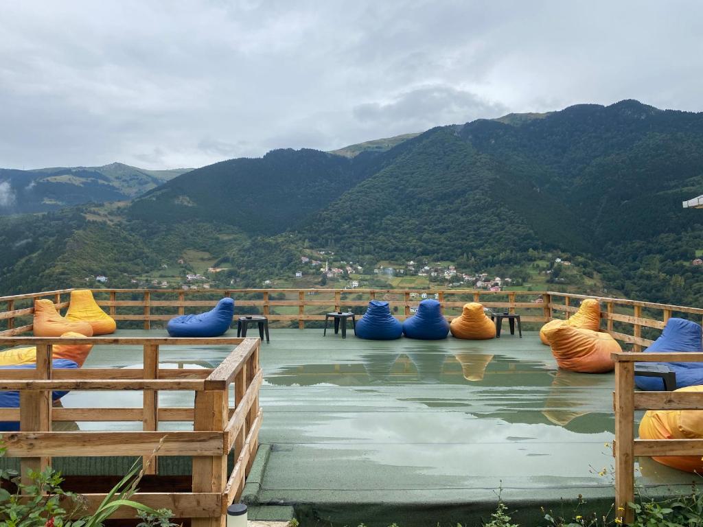 a group of bean bags sitting on top of a mountain at Yamaç Çam Hotel in Trabzon