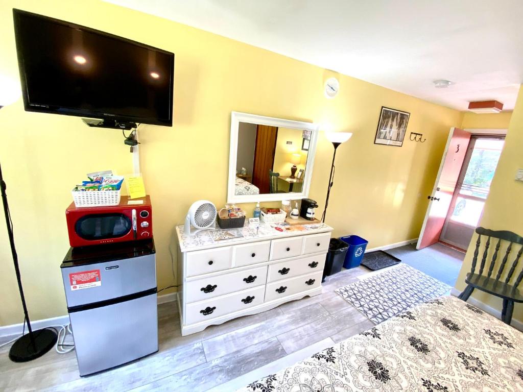 Kuchyň nebo kuchyňský kout v ubytování Snowdon Chalet Motel