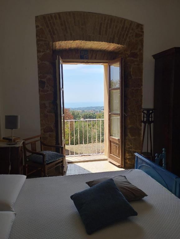 Posteľ alebo postele v izbe v ubytovaní La Villa di Minerva