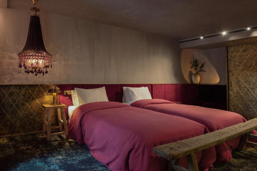 Postel nebo postele na pokoji v ubytování Unique Boutique Hotel Antibes Juan-les-Pins