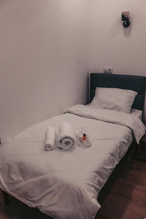 Postel nebo postele na pokoji v ubytování Apple cozy hotel