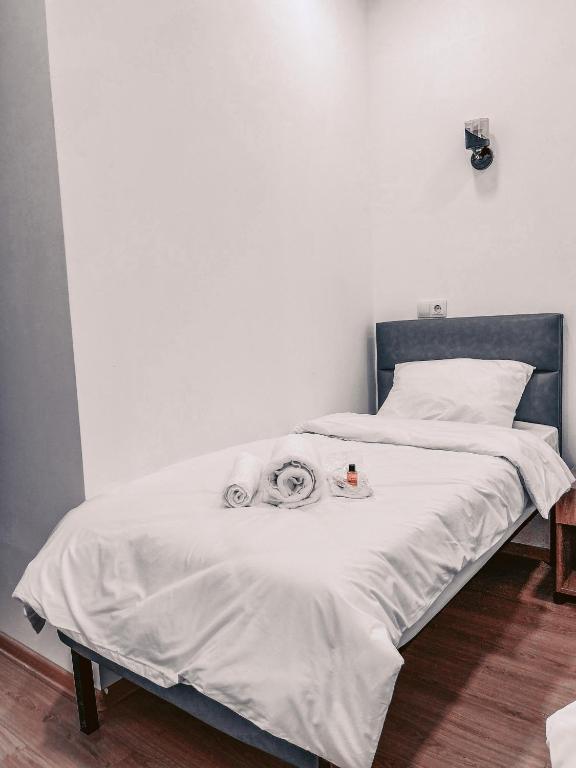 Postel nebo postele na pokoji v ubytování Apple cozy hotel