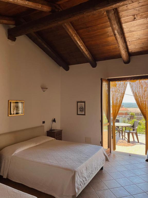 Postel nebo postele na pokoji v ubytování Agriturismo Le Viole