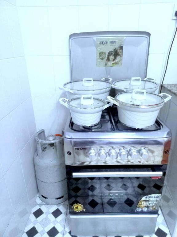 Kuchyň nebo kuchyňský kout v ubytování Jacky's Milimani suites