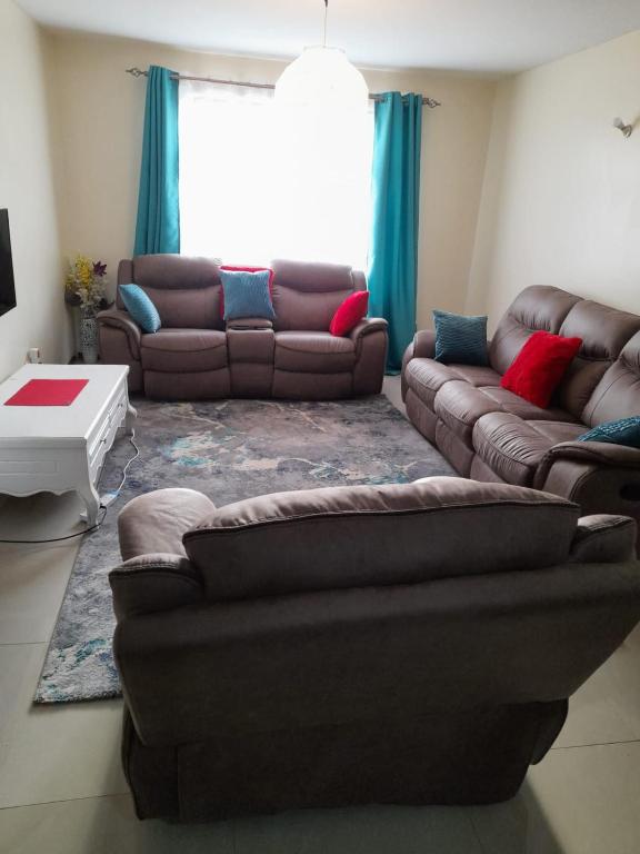 Posezení v ubytování Jacky's Milimani suites