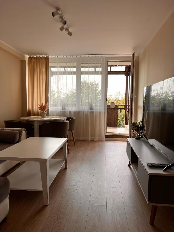 TV a/nebo společenská místnost v ubytování Apartament Harmony