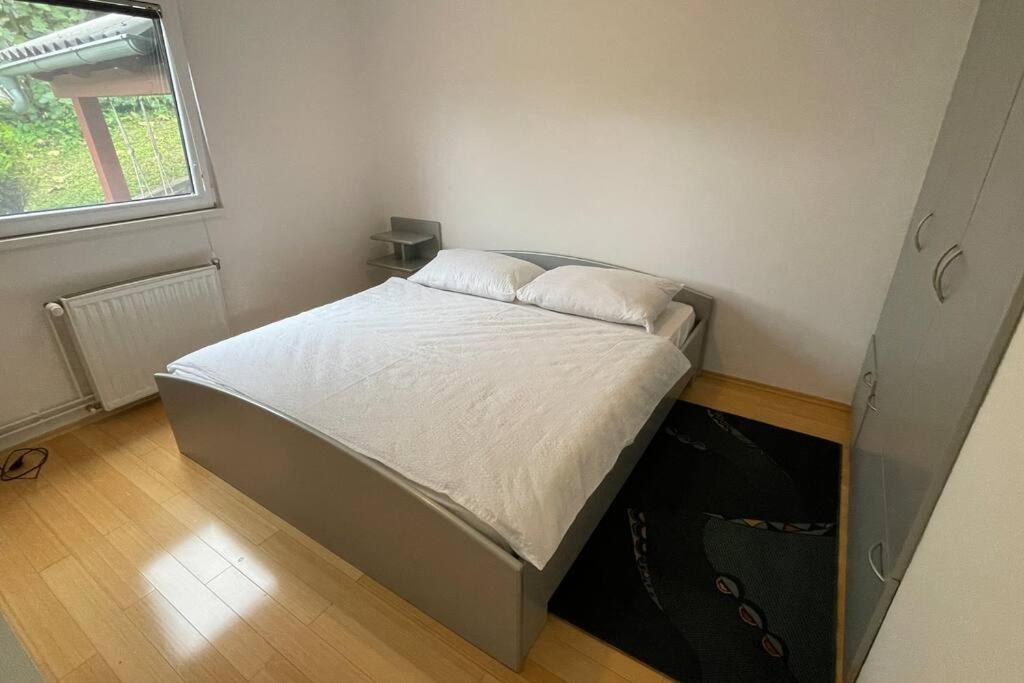 Postel nebo postele na pokoji v ubytování Family House Simba