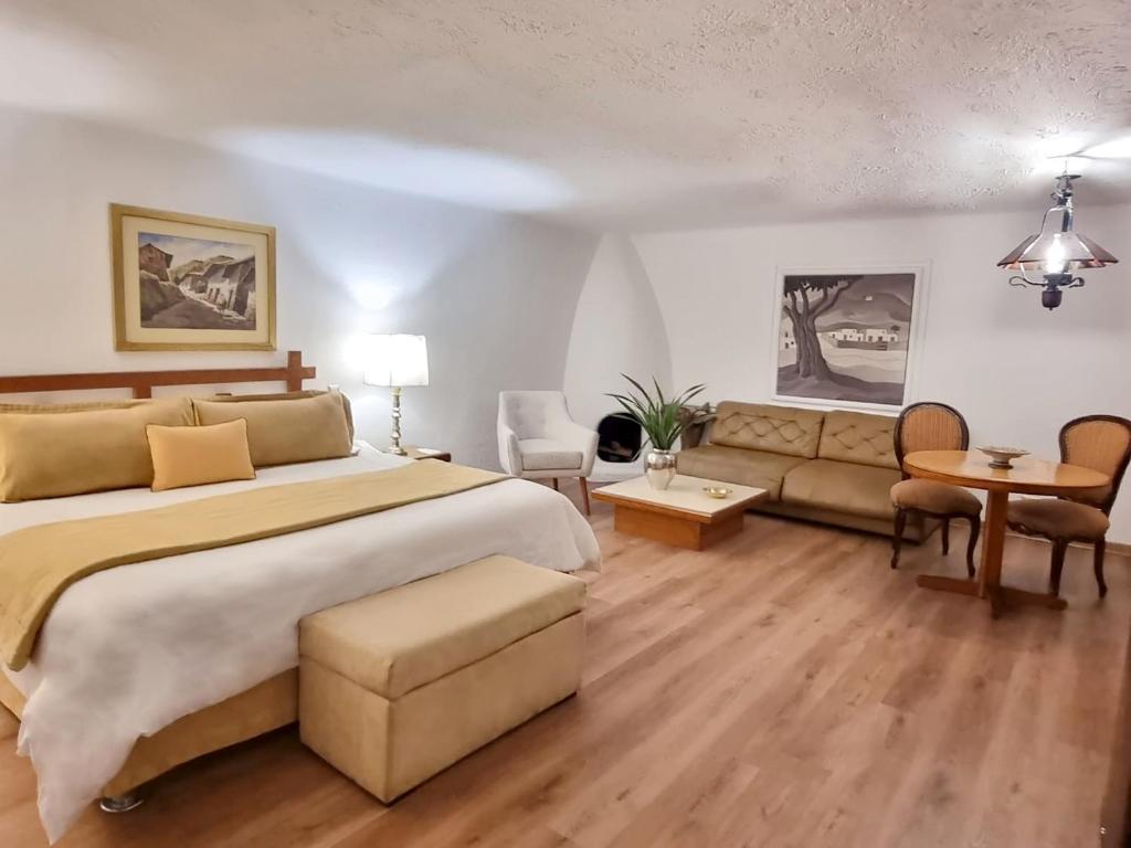 Postel nebo postele na pokoji v ubytování Antara Hotel & Suites - Miraflores