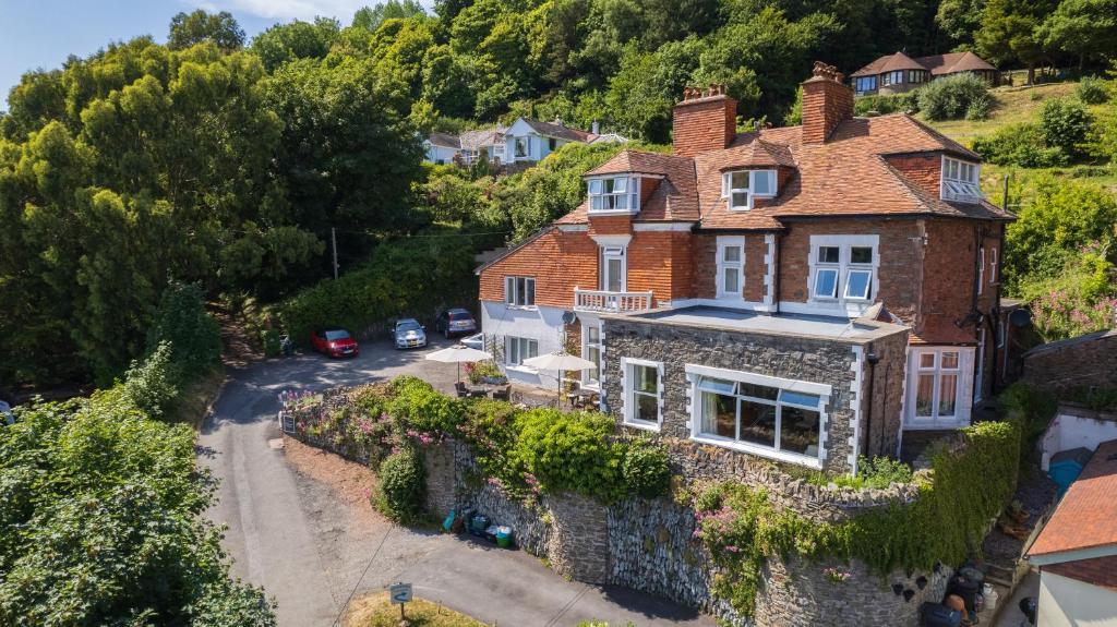 an aerial view of a house on a hill at Rockvale House in Lynton