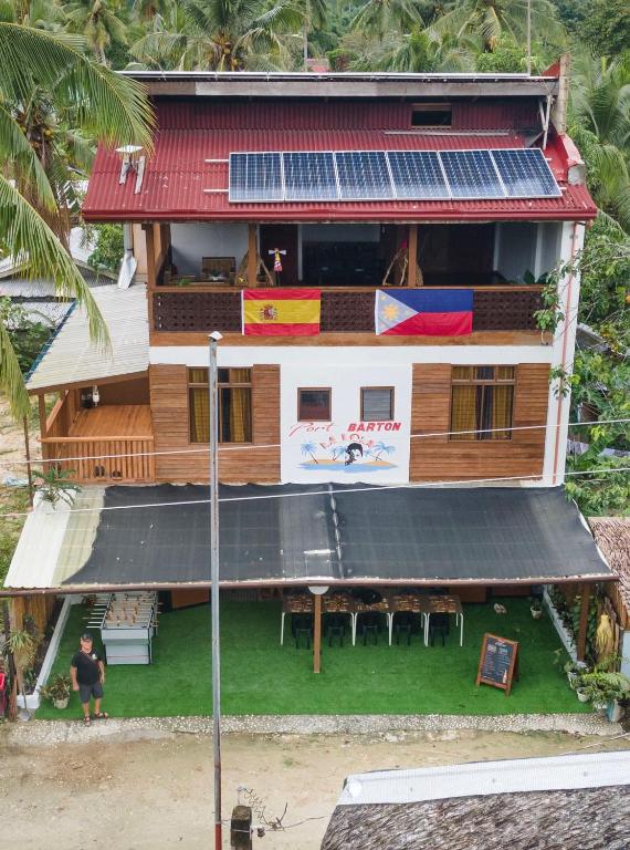 an overhead view of a house with solar panels on it at La Lola in San Vicente