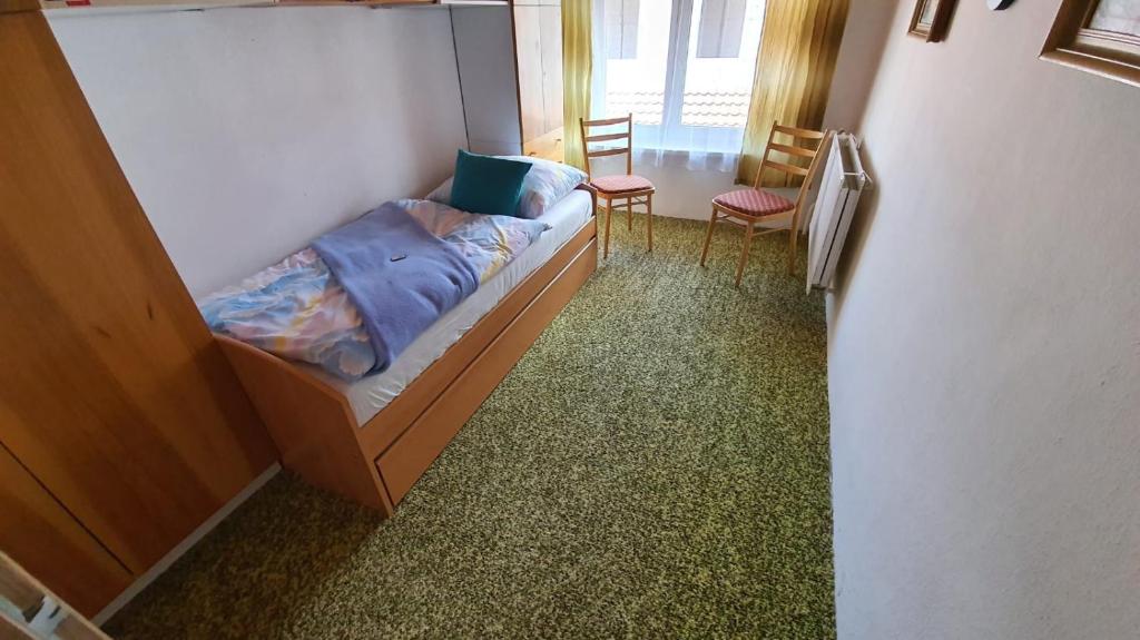 Postel nebo postele na pokoji v ubytování Retrohaus