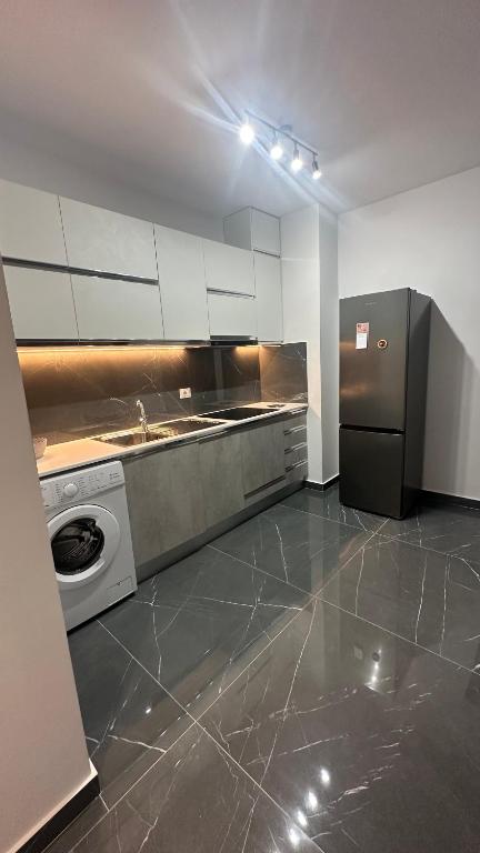 Kuchyň nebo kuchyňský kout v ubytování Sole apartments Tea
