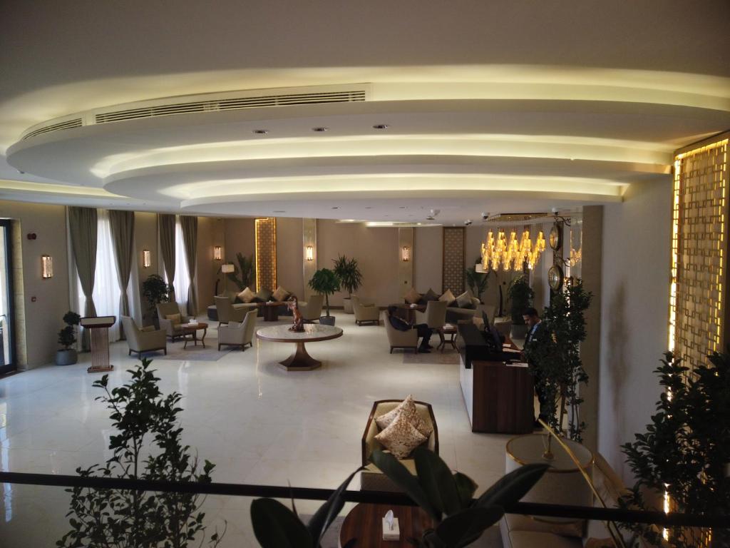Posezení v ubytování H Luxury Hotel