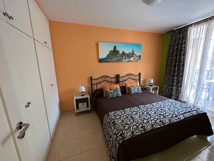 Llit o llits en una habitació de Govimar Tenerife
