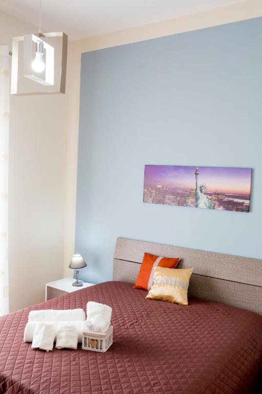 Postel nebo postele na pokoji v ubytování B&B L'Aurora CAPUA