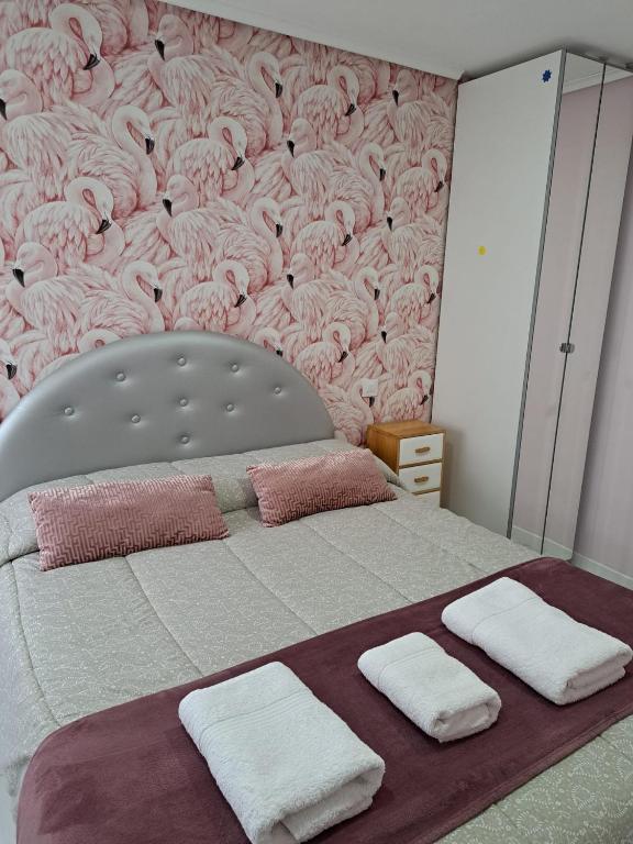 Łóżko lub łóżka w pokoju w obiekcie Apartamento Zona Playa y centro Ciudad