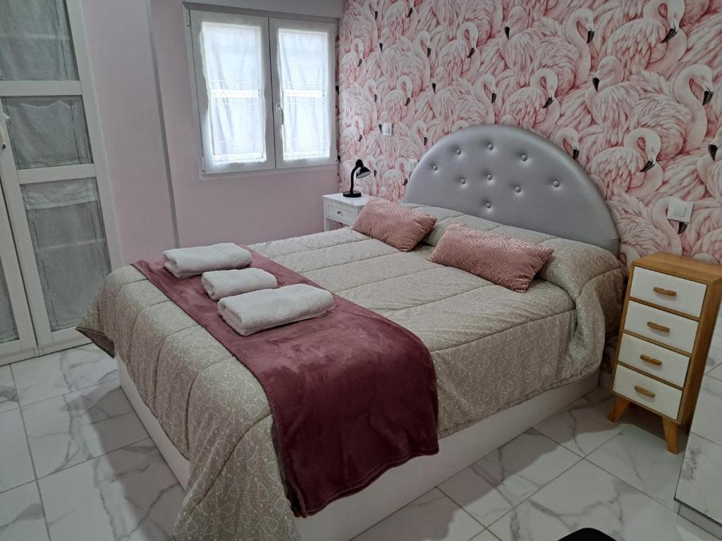 Łóżko lub łóżka w pokoju w obiekcie Apartamento Zona Playa y centro Ciudad