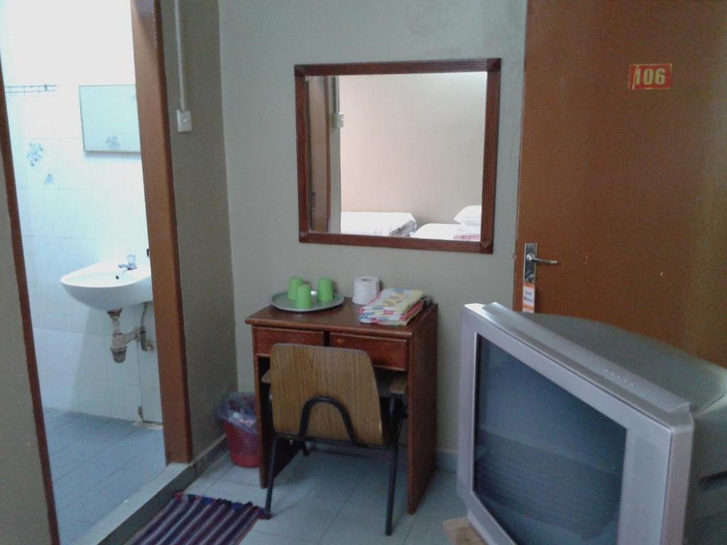 Koupelna v ubytování HotelMalaya