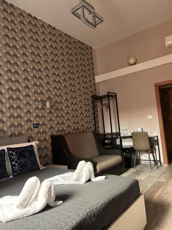 Łóżko lub łóżka w pokoju w obiekcie Vanella Rome Domus