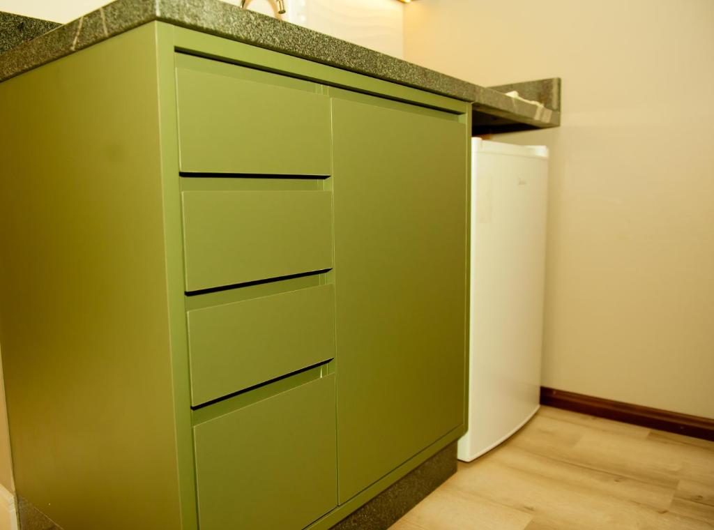 Kuchyň nebo kuchyňský kout v ubytování HOSPEDAGEM CASA COMPACTA