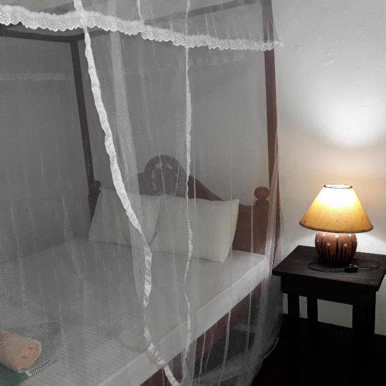 Postel nebo postele na pokoji v ubytování Villa Pipe Dream