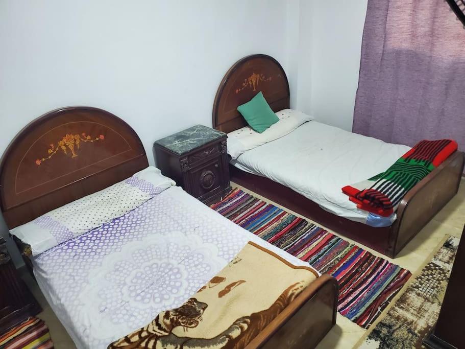 Postel nebo postele na pokoji v ubytování If you love calm this is for you 2 days minimum,air-conditioning FAMILY only please