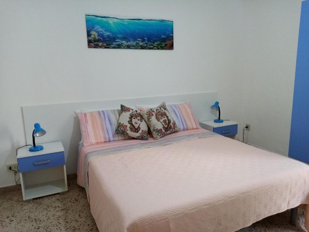 Posteľ alebo postele v izbe v ubytovaní Da Giusy