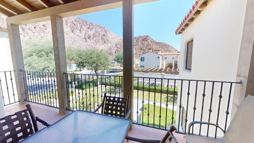 a balcony with a view of a mountain at LV112 Delightful Upstairs 1 Bedroom Legacy Villa in La Quinta