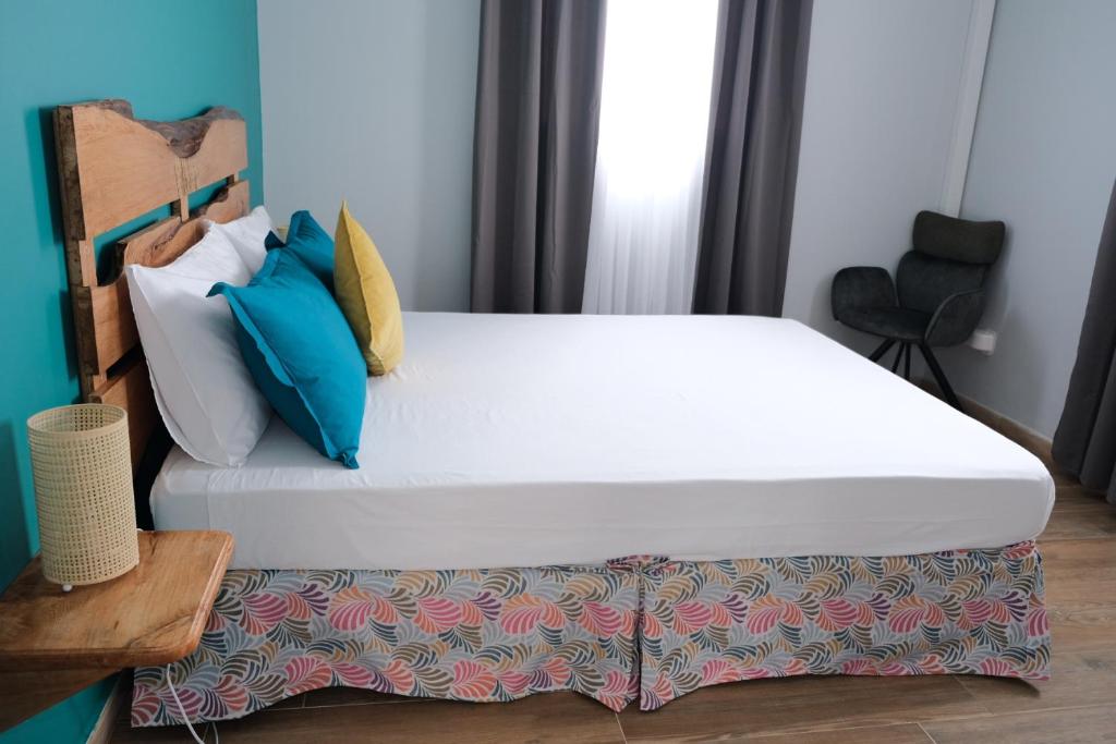 Postel nebo postele na pokoji v ubytování Résidence Terre et Passion