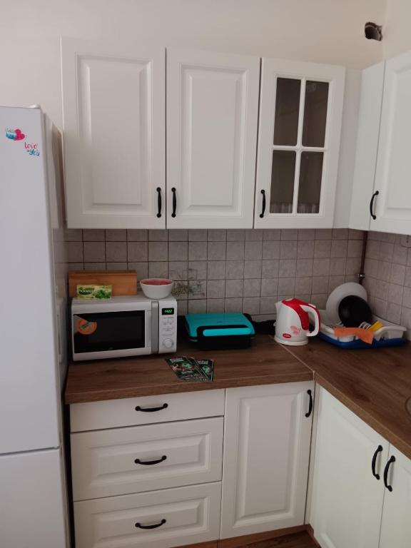 Kuchyň nebo kuchyňský kout v ubytování Hostel Jasmin