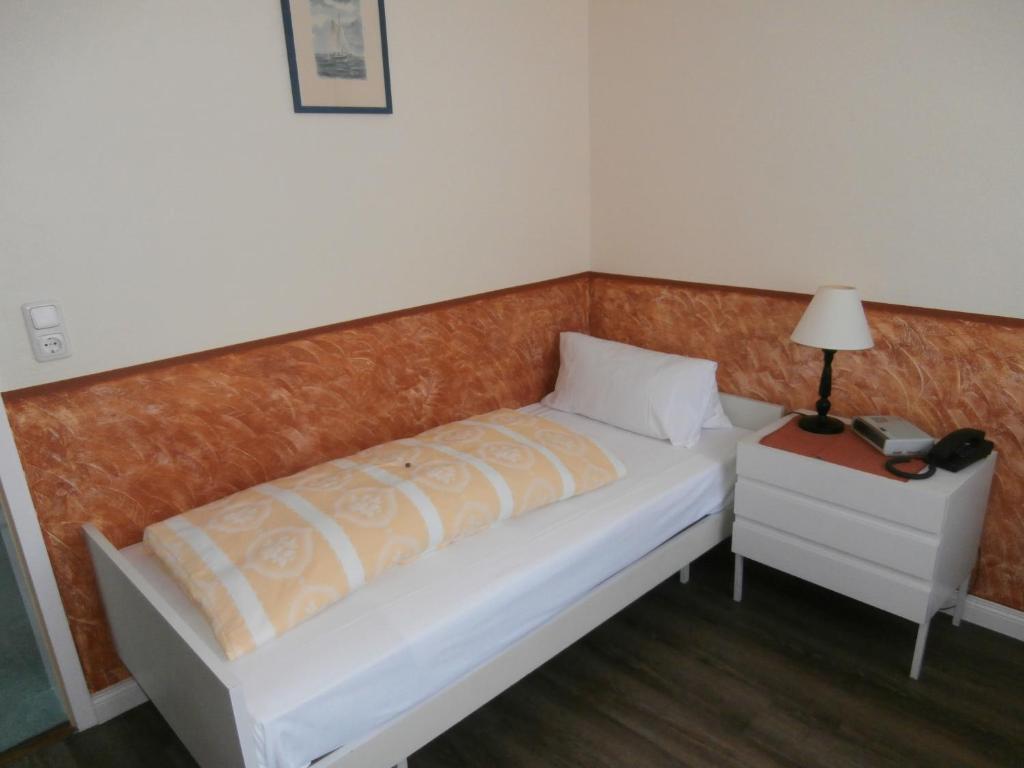 Katil atau katil-katil dalam bilik di Hotel Hasselbarth