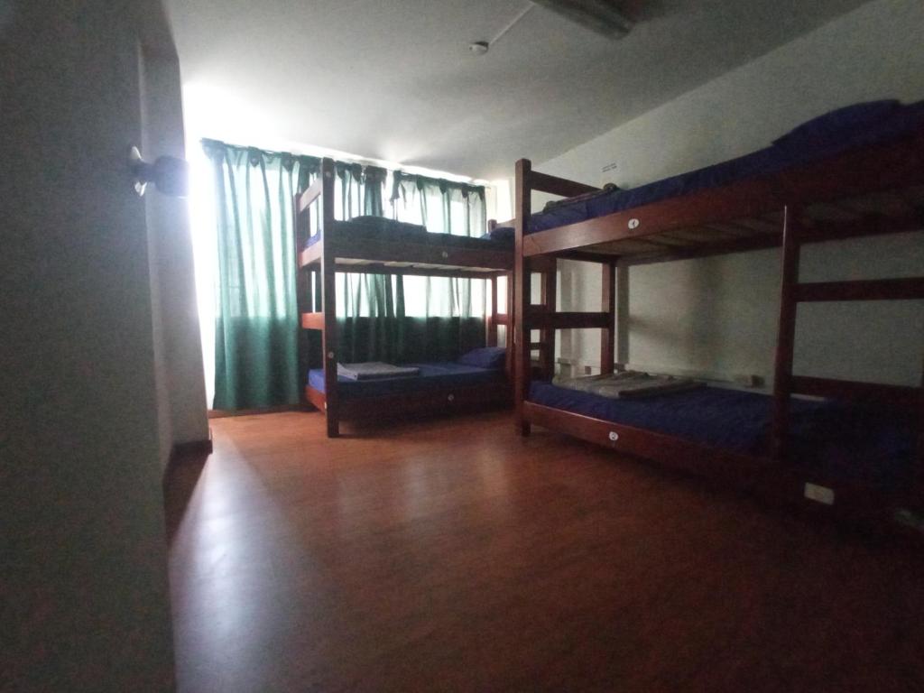 Postel nebo postele na pokoji v ubytování North House Hostel