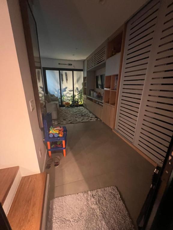 an overhead view of a hallway of a house at Espaço Coletivo Zen &Catividade in São Paulo