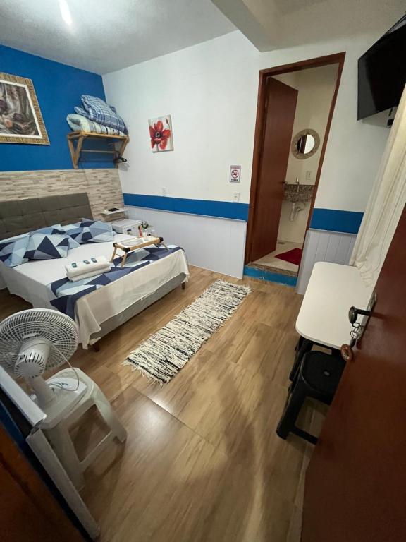 Cama ou camas em um quarto em Pousada Antares