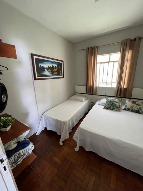 Cama ou camas em um quarto em Pousada Antares